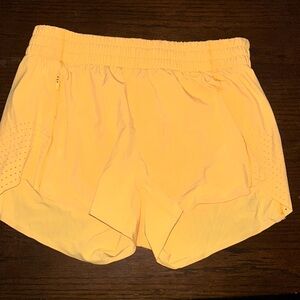 Orange Hustle 3” Athleta shorts XS
